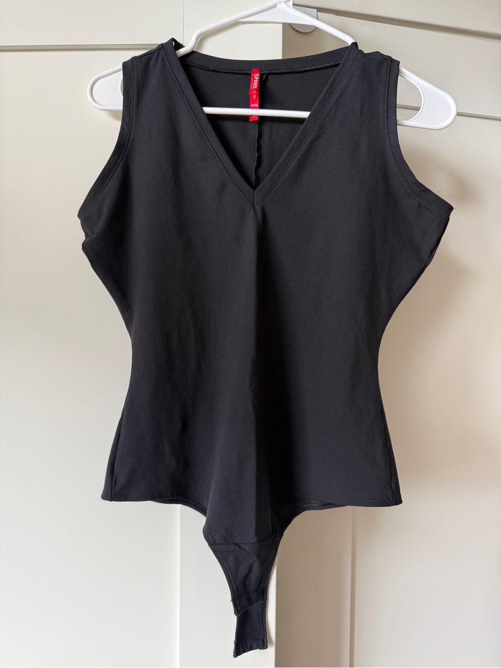 Sleeveless V-Neck Bodysuit, Size M by SPANX
